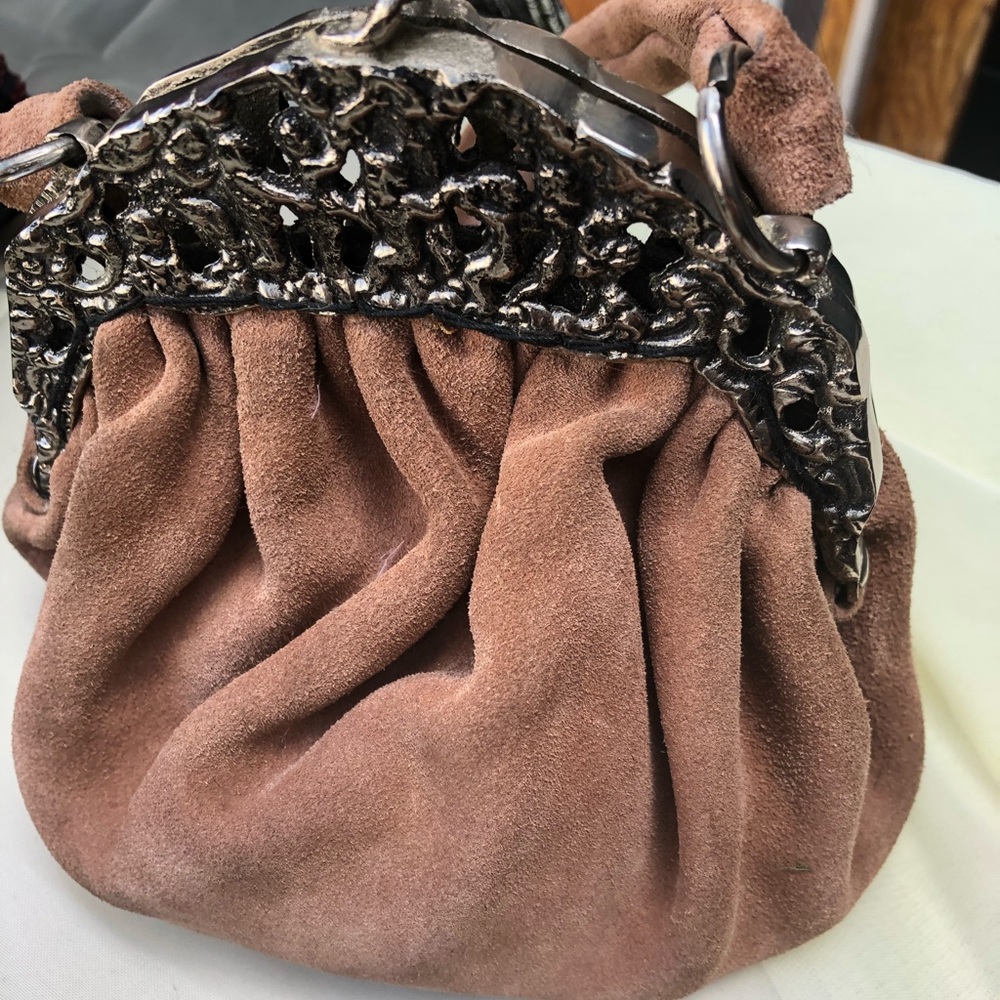 Suede vintage purse with ornate metal trim